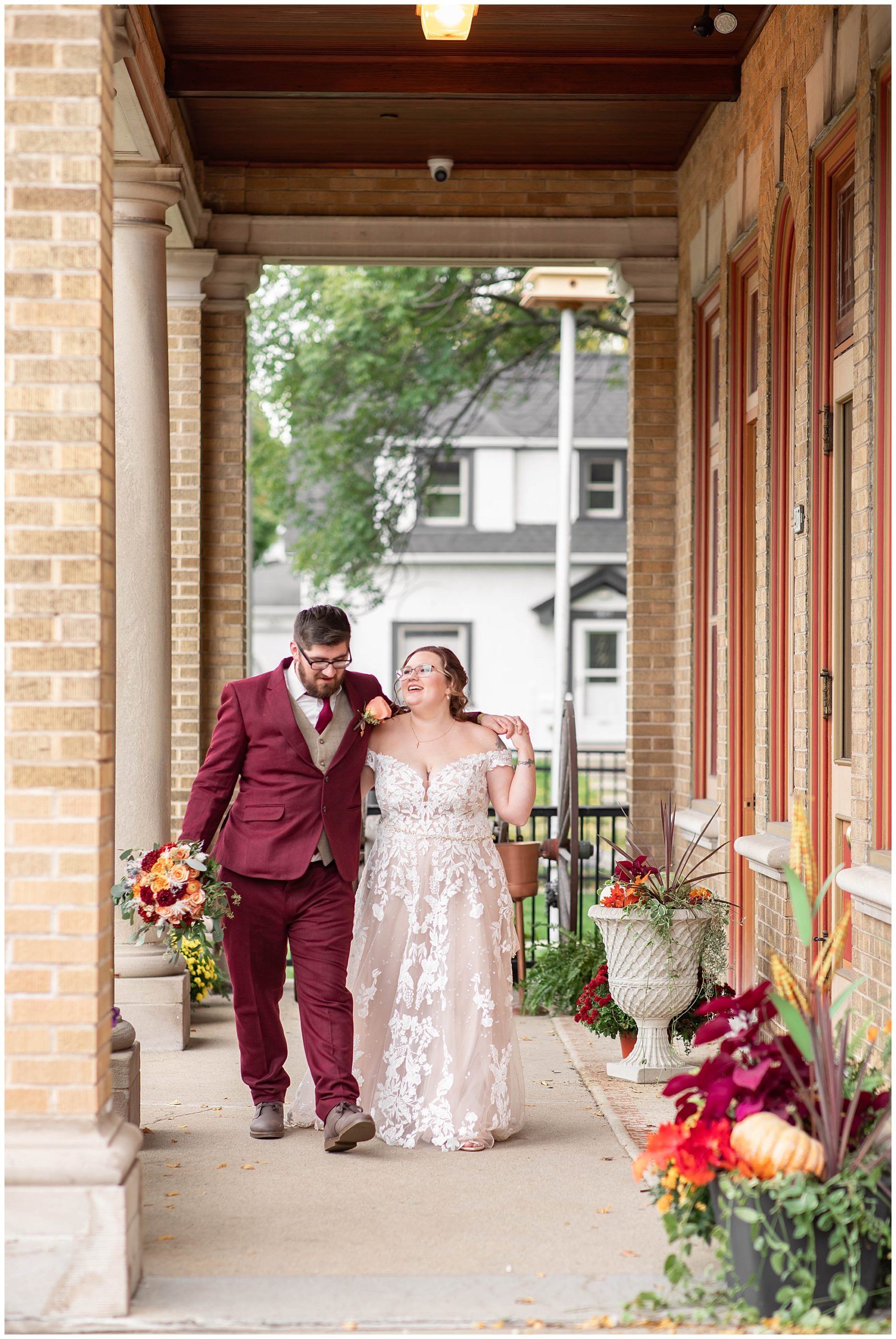 Couple's Wedding Photos on front porch of Story Hill Firehouse 
