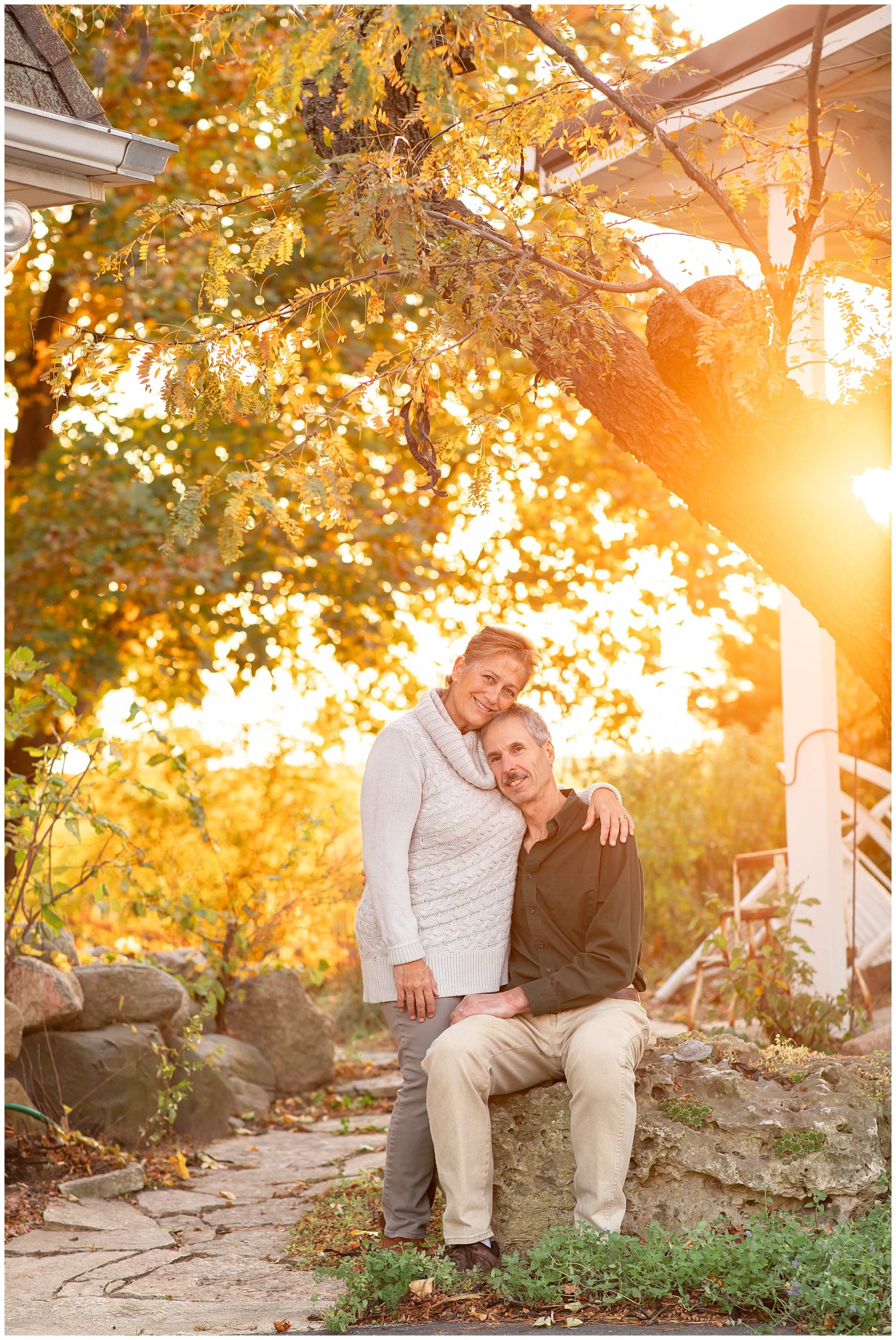 couples portrait at sunset on family farm