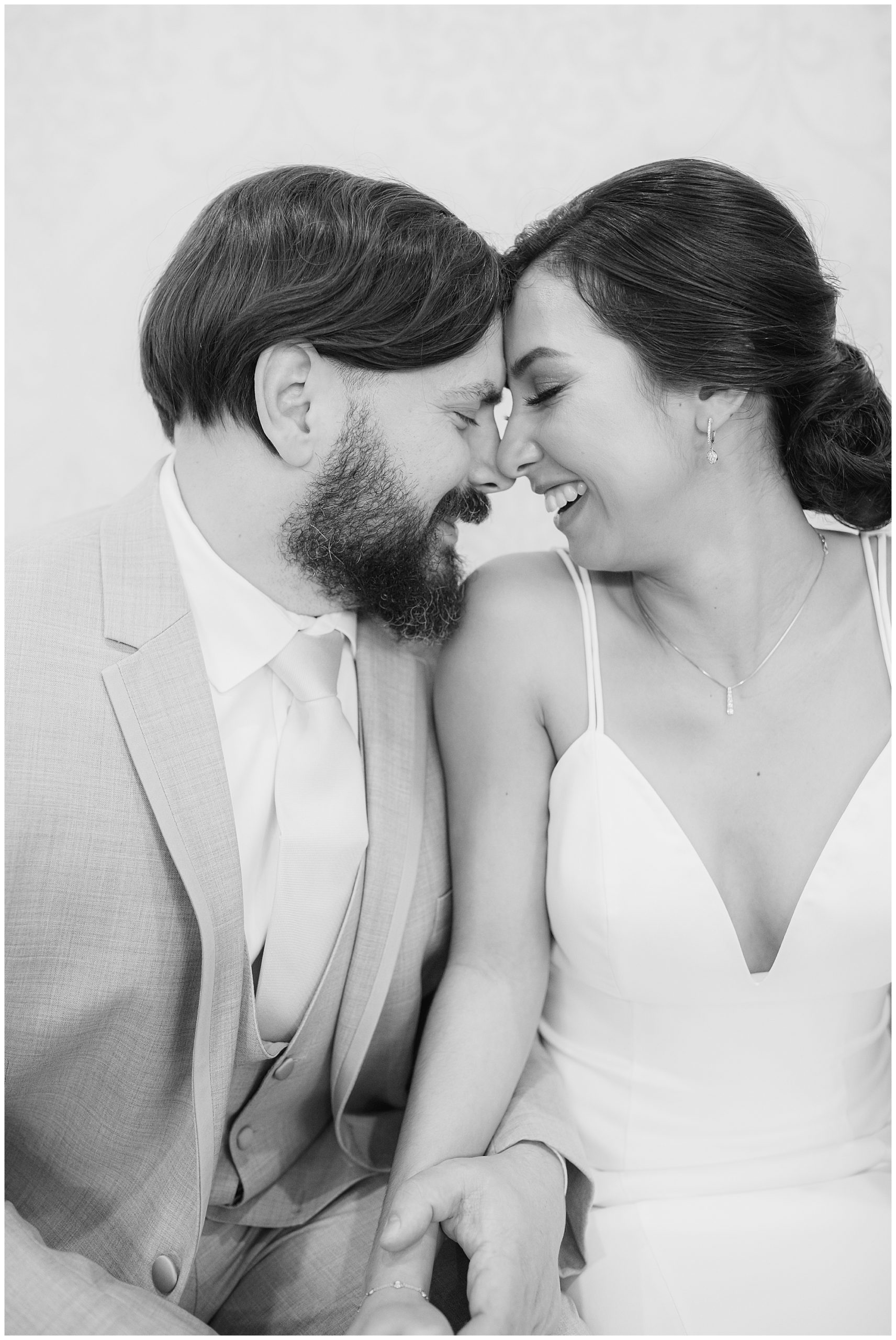couple nuzzled, black and white wedding portrait, romantic wedding photos